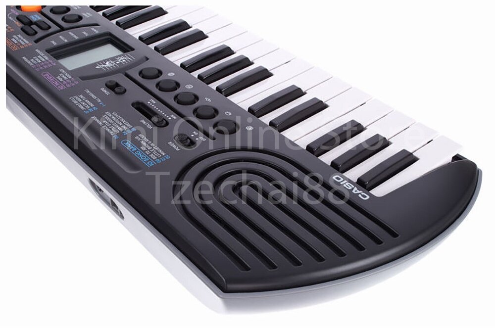 44 Key Casio SA-77 Orange Mini Electronic Keyboard Piano Organ LCD 8 Note Polyphony 100 Tones 50 Patterns 10 Song One Touch Switch